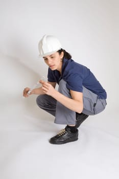 Female Engineer Measuring Folding Rule