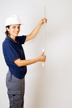 Female Engineer Measuring Folding Rule