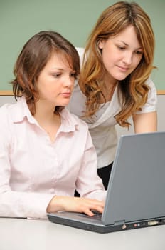 Young women in office