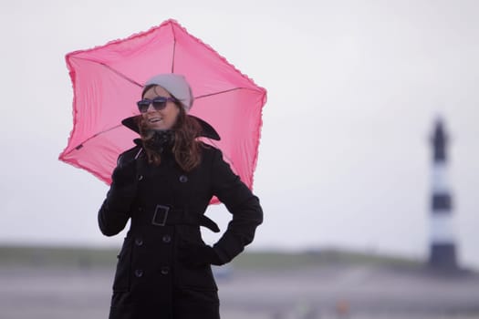 young woman with pink screen