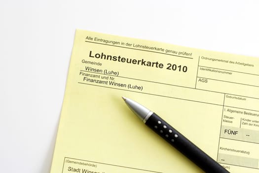 Income tax card 2010 with ballpoint pen