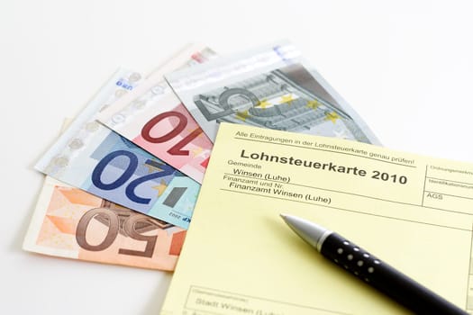 Income tax card 2010 with ballpoint pen