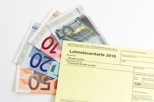 Income tax card 2010 with banknotes