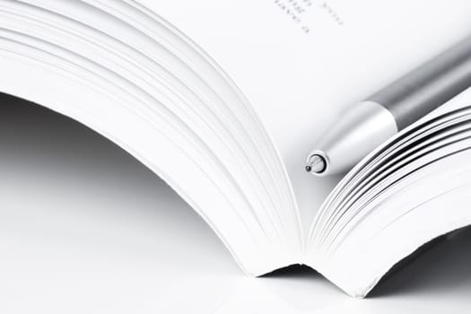 open book and pen