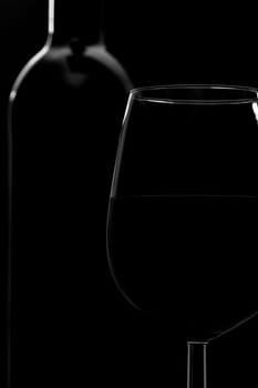 Glass of Wine and Wine Bottle