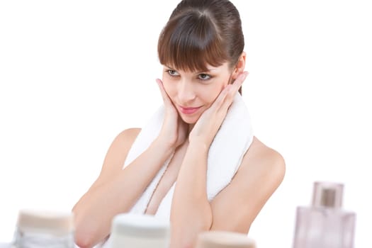 Body care Young woman applying powder with brush