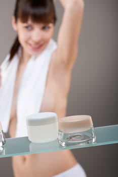 Body care Young woman in bathroom