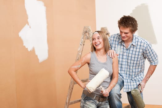 Home improvement Young couple painting