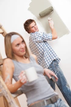 Home improvement Young couple painting