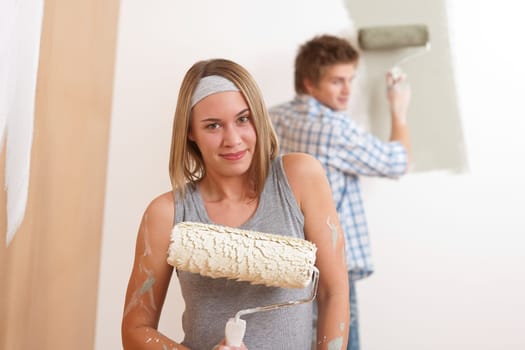 Home improvement Young couple painting