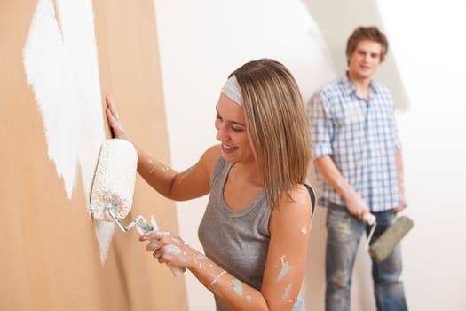 Home improvement Young couple painting