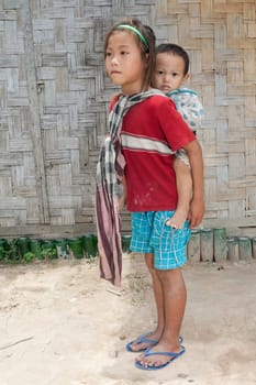 Girl from Laos with baby