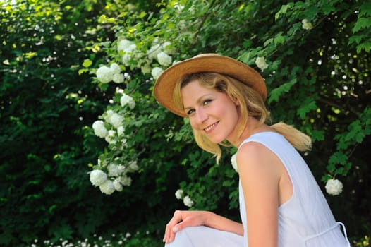 Young woman resting in garden