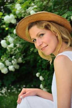 Young woman resting in garden