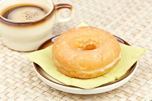 Delicious donut with coffee