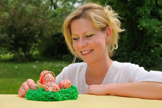 Young woman and easter eggs