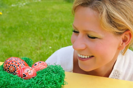 Young woman and easter eggs