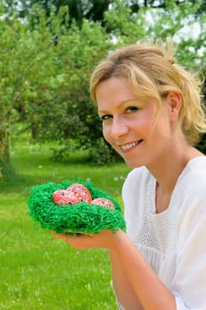 Young woman and easter eggs