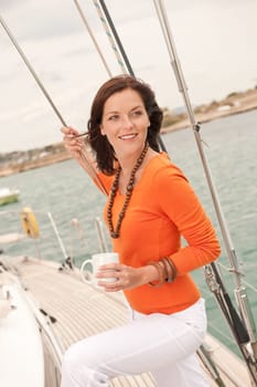 Young woman sailing on yacht