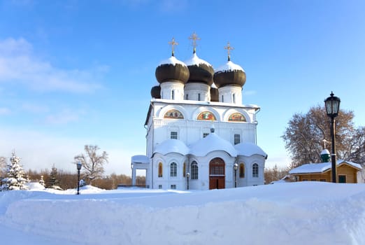 Christian monastery in winter sunny day