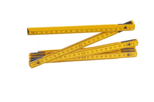 Yellow wooden ruler.