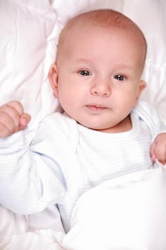 Adorable newborn in bed