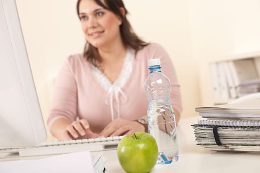 Young businesswoman at office