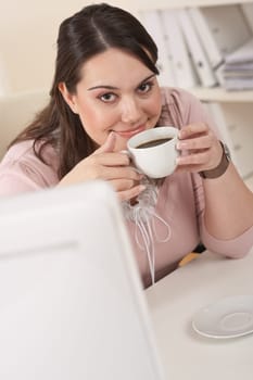 Young businesswoman at office