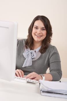 Young businesswoman working at office
