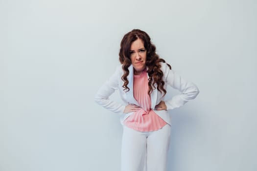 woman in white suit angry anger rage hate contempt