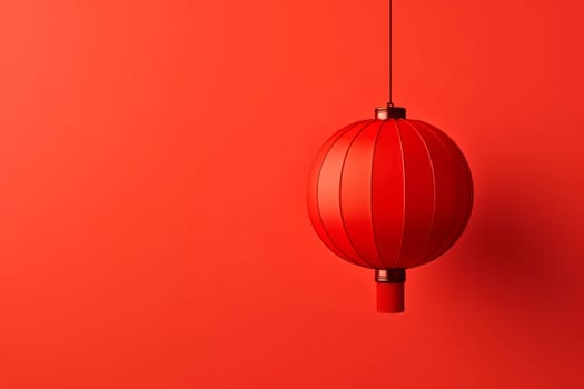 Red Chinese flashlight on a light background. Minimalism.