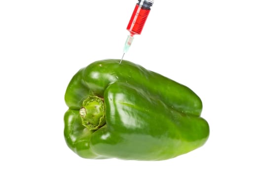 Green pepper with syringe inserted