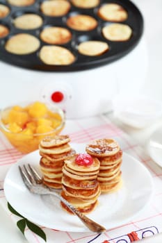 Sweet mini pancakes with pancake maker