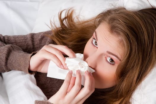 Young woman with runny nose