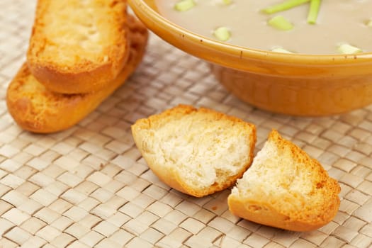 Cream of mushroom soup and bread croutons