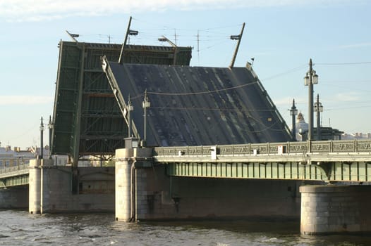 Raising the Schmidt Bridge over Neva river in Saint Petersburg, Russia