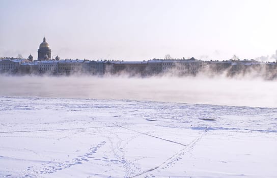 Fogged Neva River and St. Isaac Cathedral (left in the background) in Saint Pete