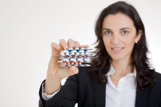 Pretty woman with various pills