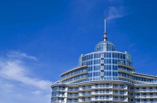 The top of a new building of a hotel or business center.