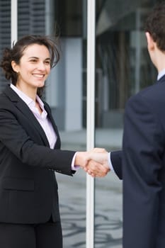 Businesswoman greeting an applicant