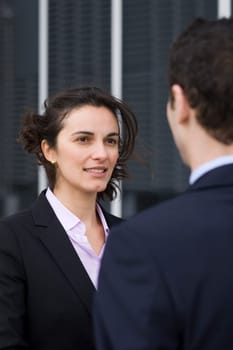 Businesswoman greeting an applicant