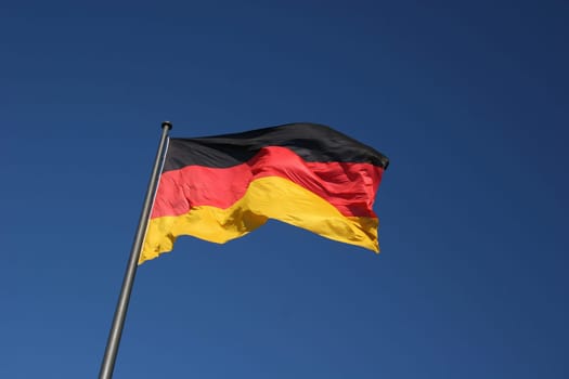 German flag in front of the Berlin Reichst