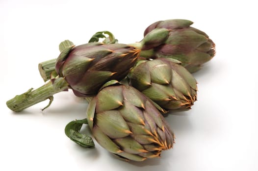 four artichokes closeup