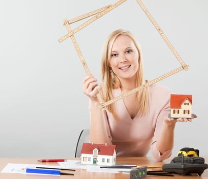 woman architect at her work table