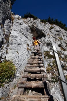 Descent via a steep staircase