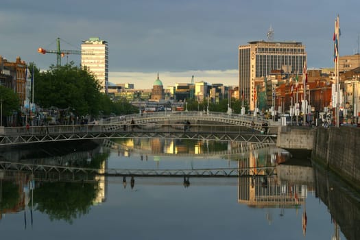 Half-penny bridge reflected in the Liffey