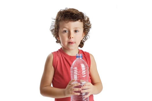Adorable boy drinking water