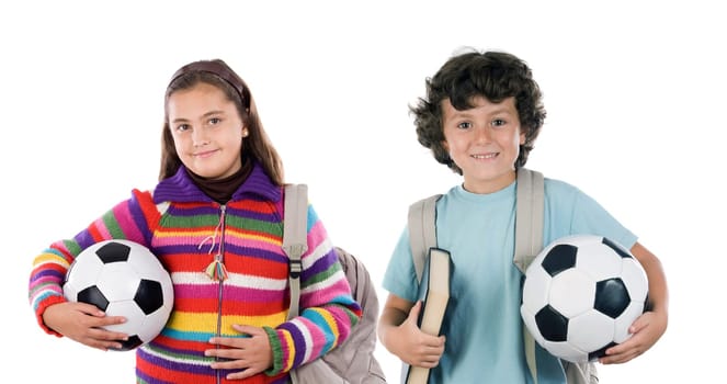 Two adorable children with soccer balls