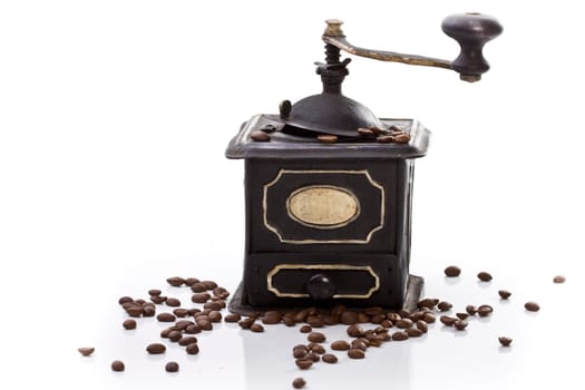Old coffee grinder with coffee beans wd604