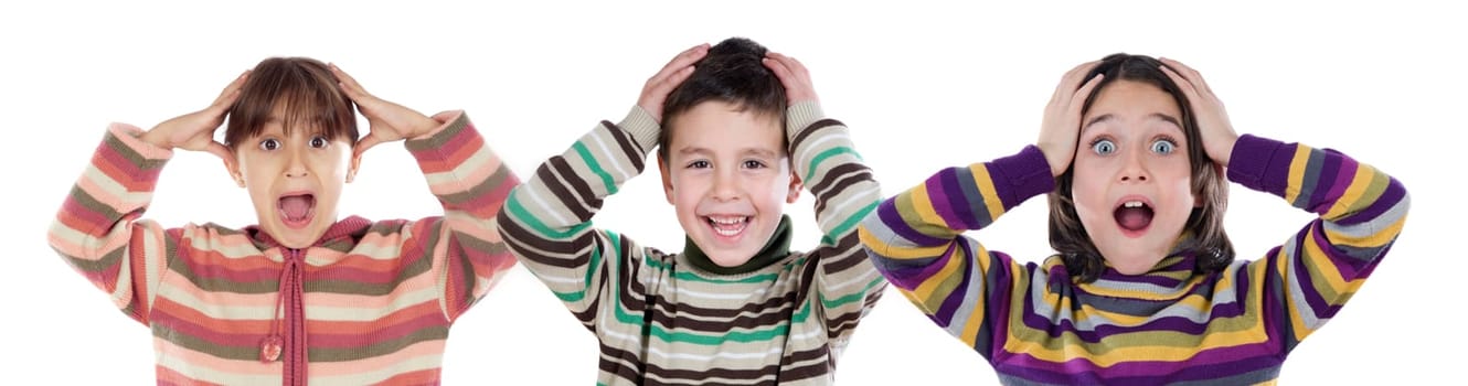 Three funny children surprised